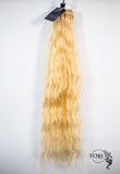 Blonde. 613  Natural Wavy.